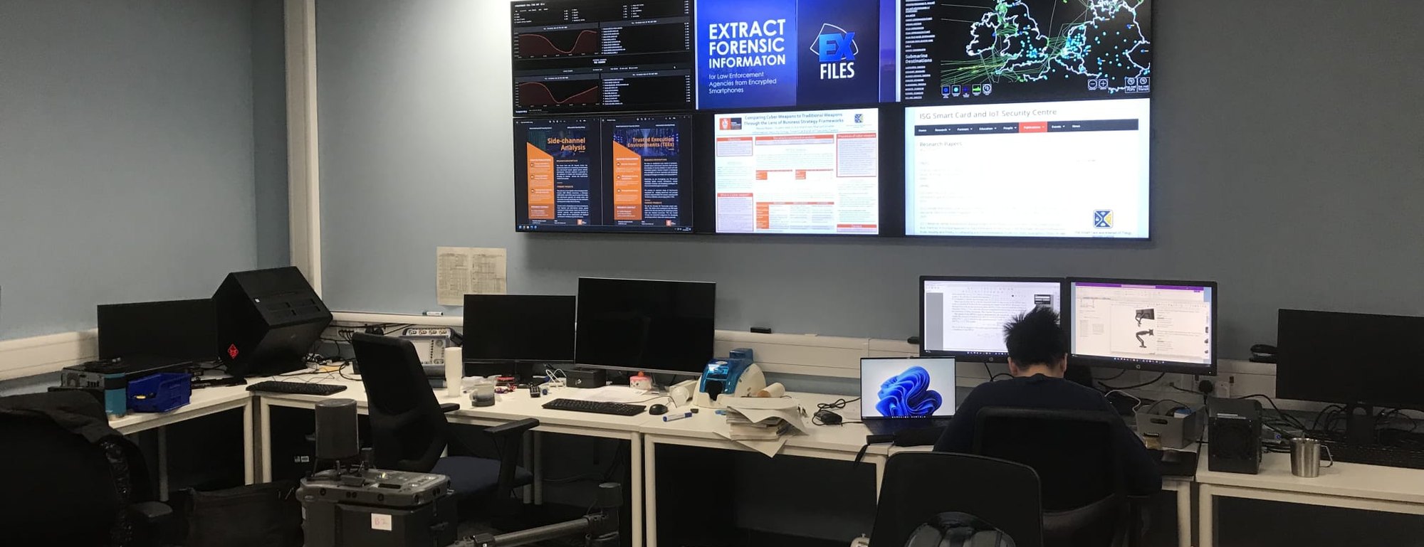 The centre&rsquo;s laboratory at Royal Holloway, with drone platforms and the project video wall
