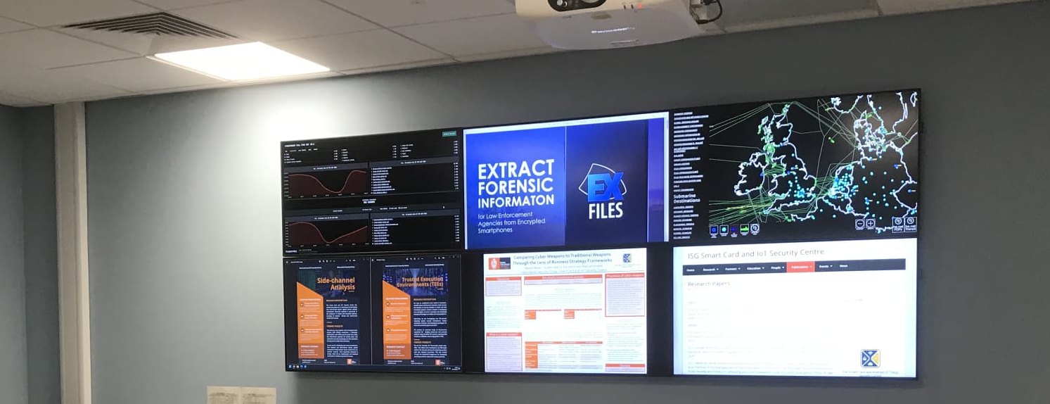 Research posters on the laboratory video wall